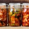 This shows three jars of kimchi